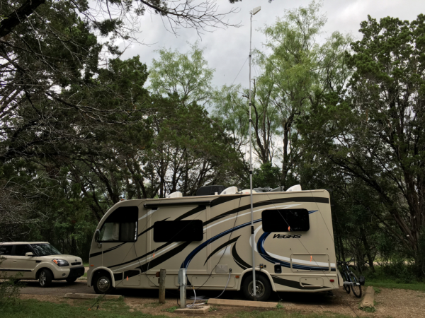 Heavy Duty mast used with a Drive on Mount at a RV park camp site to increase their WiFi reception range extension