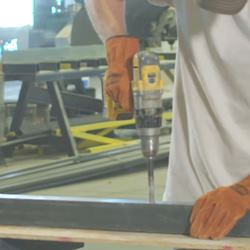 Drilling through fiberglass preformed shapes with a hand held drill 250x250 - MAx-Gain Systems, Inc.
