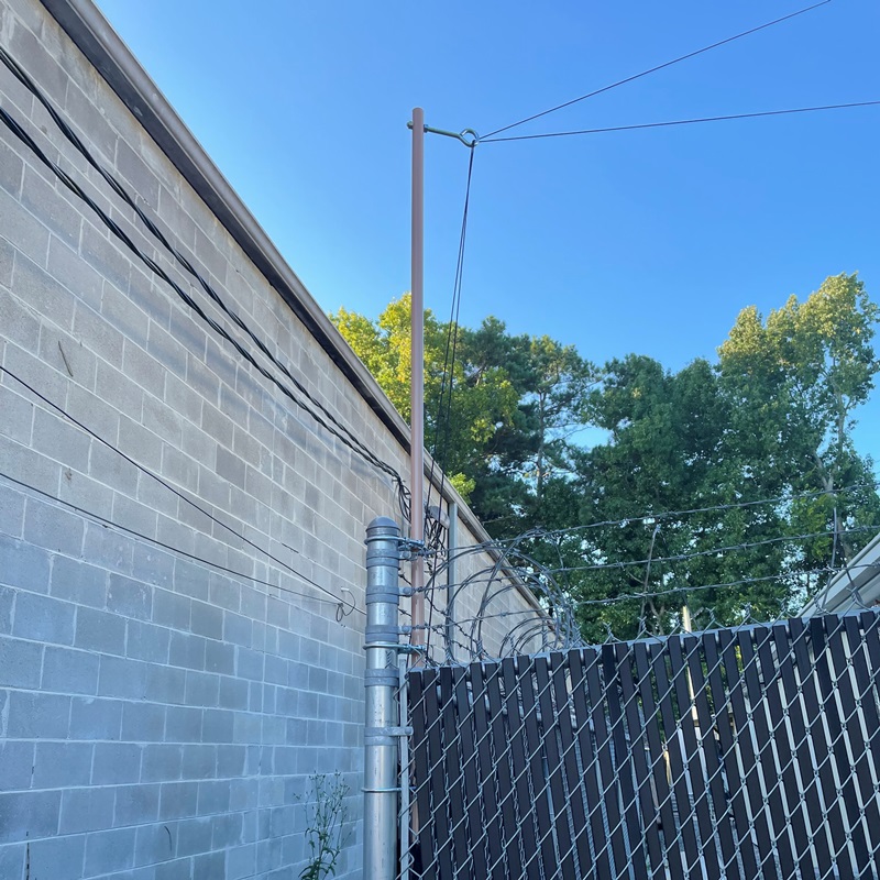 Elevated Guy point installation on a fence post 800x800 - Max-Gain Systems Inc
