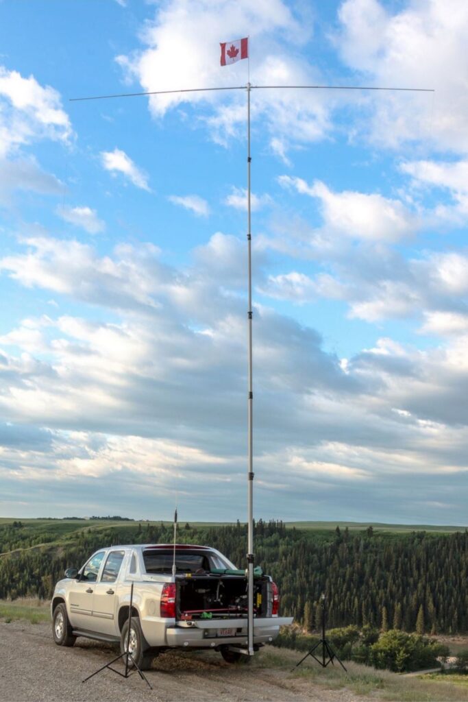 Jerry Clements VE6AB MK-4-HD 25 foot Fiberglass Push Up Mast for signal strength testing Mountain 1500x1000 - Max-Gain systems, Inc