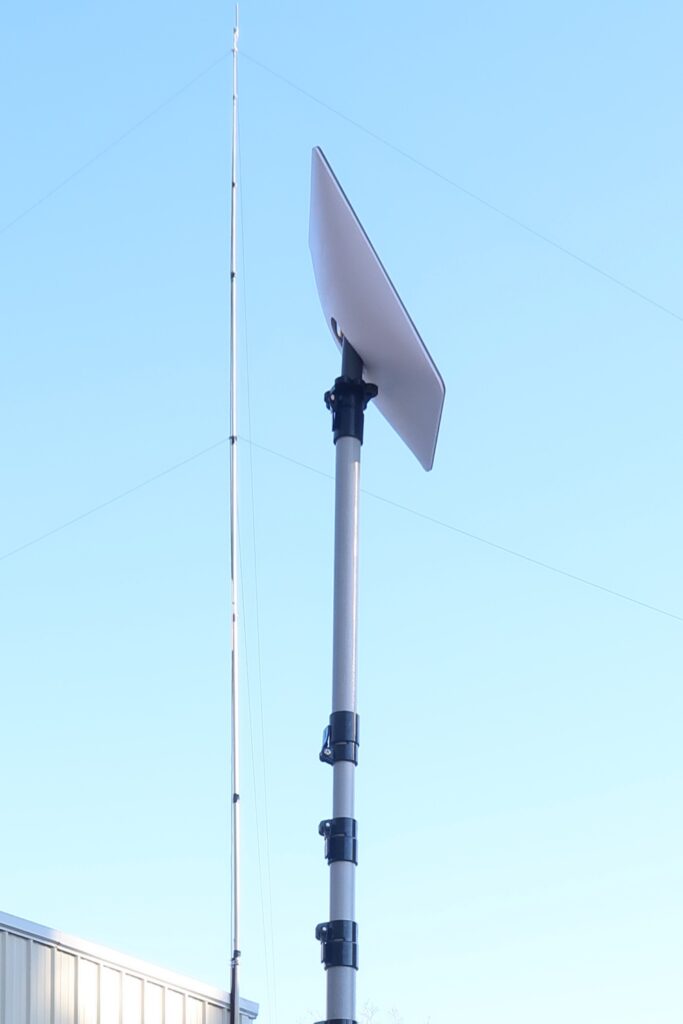 Starlink mounted on top of a fiberglass push up mast 1500x1000 - Max-Gain systems, Inc